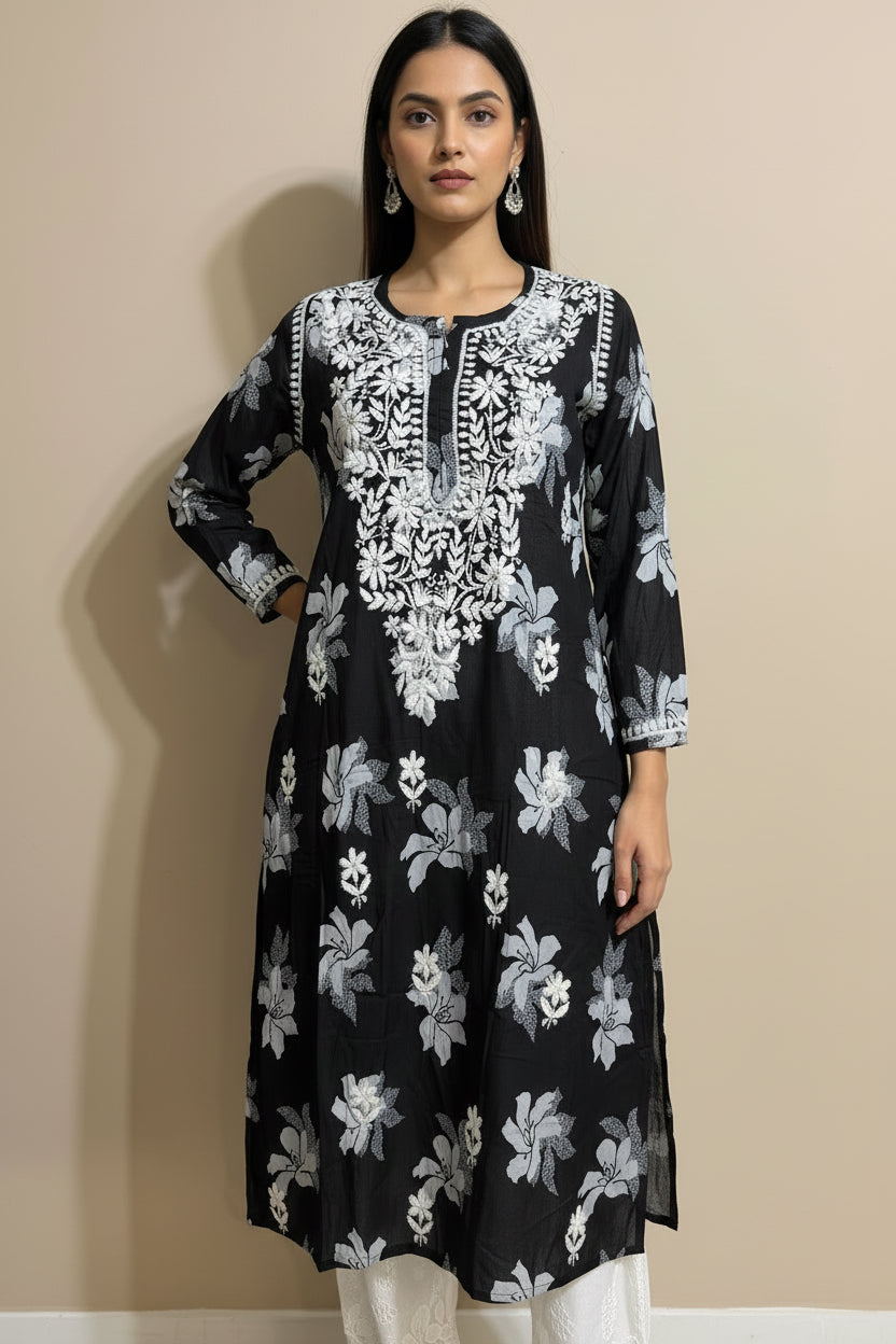 Black dress with white floral pattern on a mannequin against a beige background