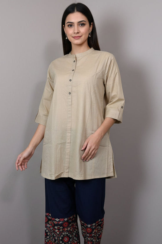Beige kurta on a mannequin against a plain background